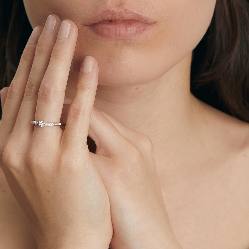 Solitaire ring 375/9K witgoud Diamant 0.20 ct, 19 Steen, w-si