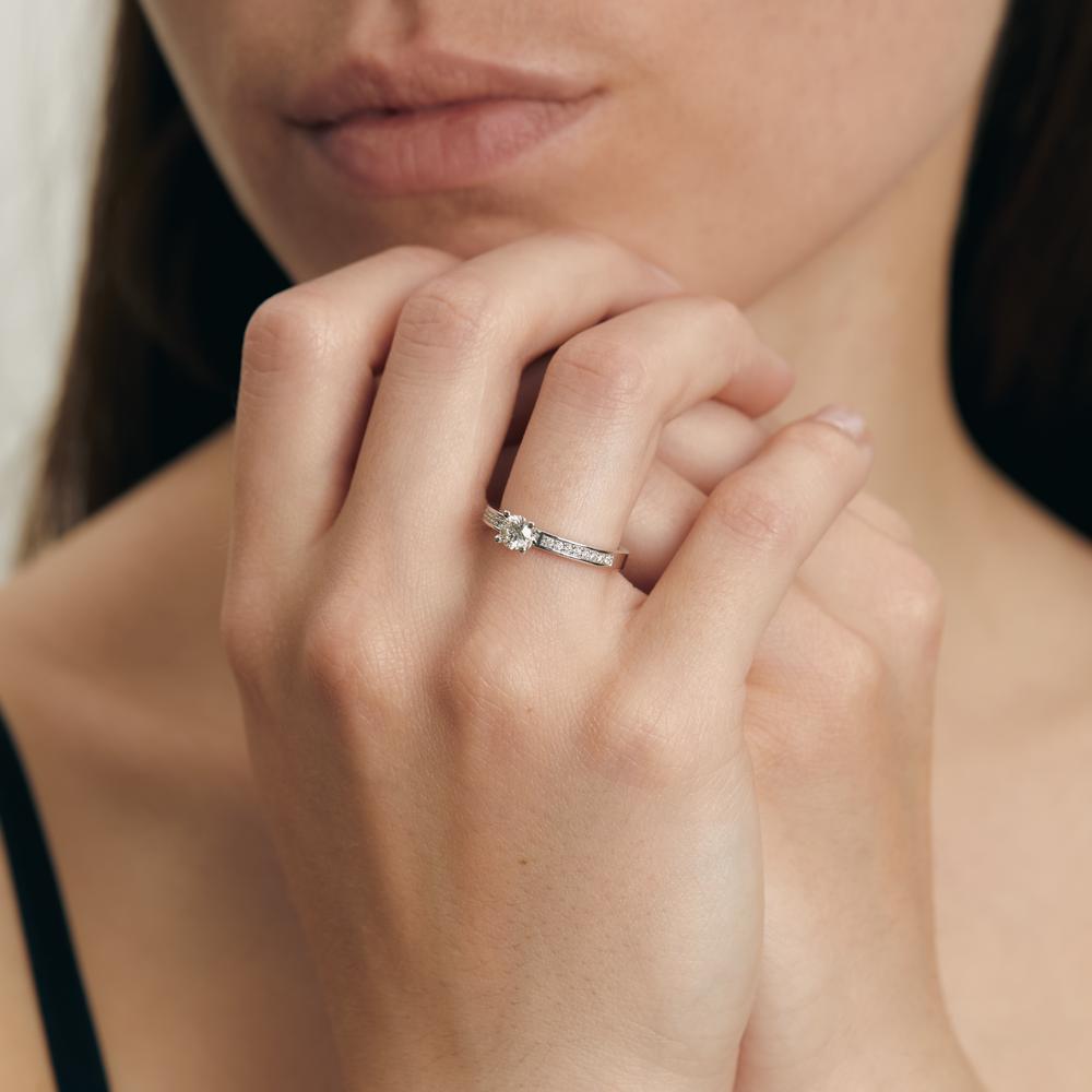 Solitaire ring 750/18K witgoud Diamant wit, 0.08 ct, 16 Steen, [Brillant], w-si, Diamant wit, 0.32 ct, [Brillant], w-si